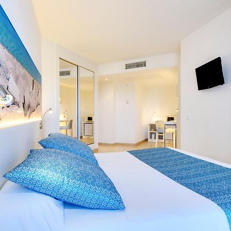Aparthotel Tropic Garden Santa Eularia des Riu Bagian luar foto