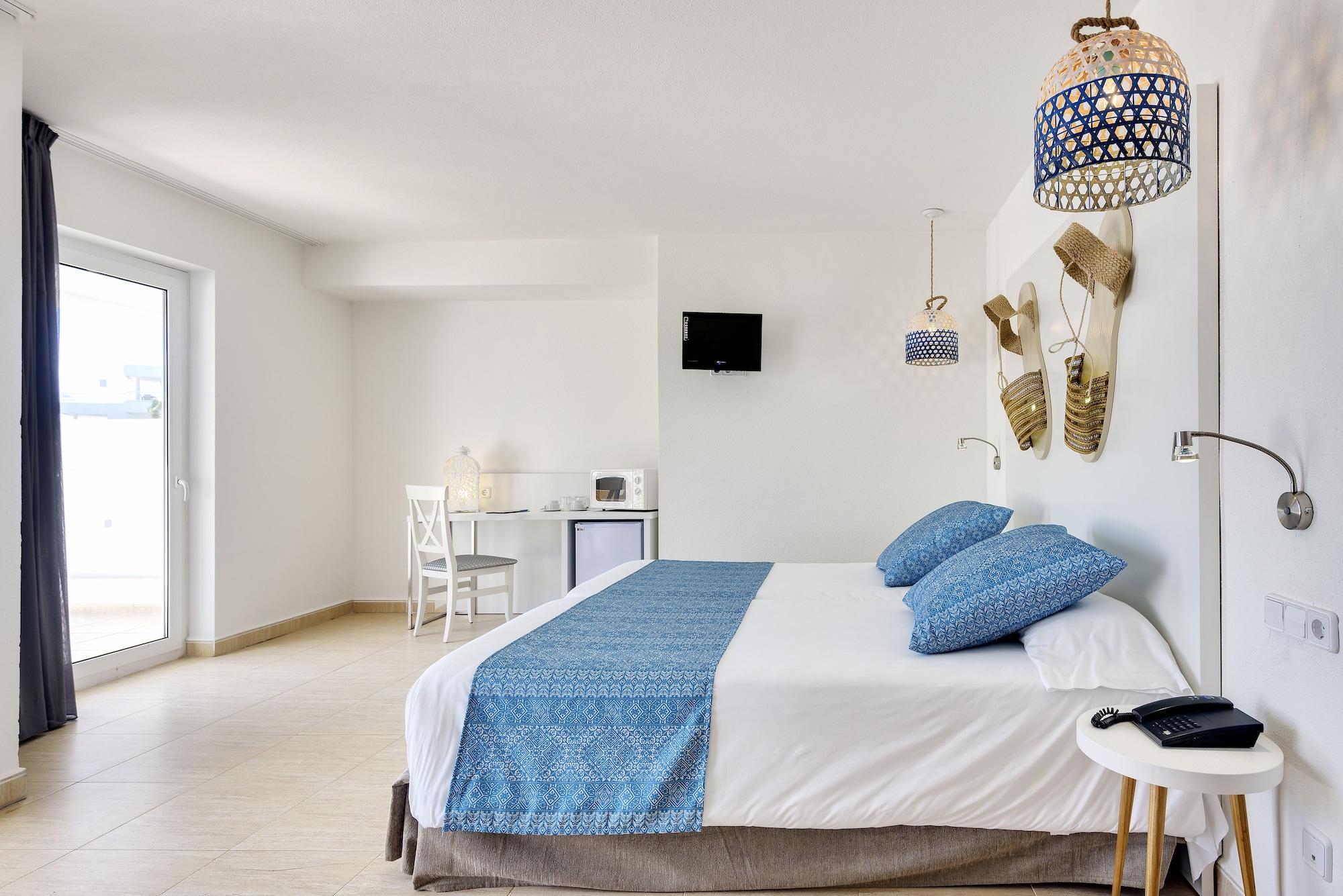 Aparthotel Tropic Garden Santa Eularia des Riu Bagian luar foto