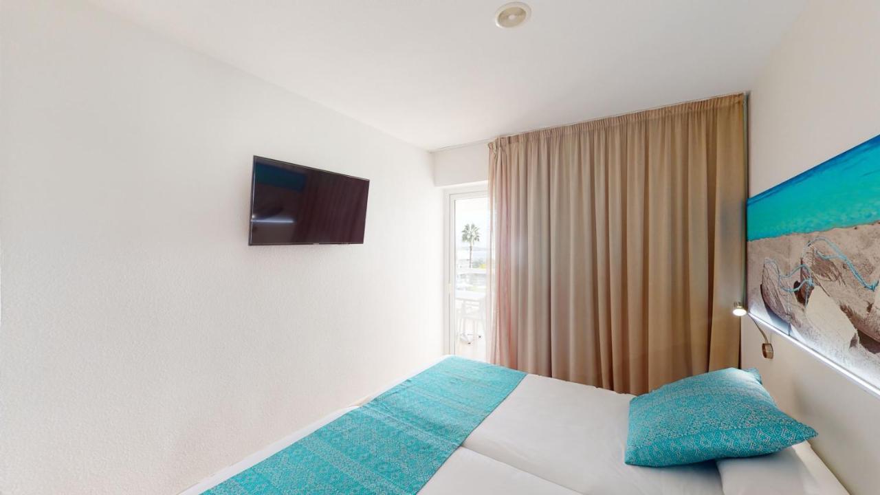 Aparthotel Tropic Garden Santa Eularia des Riu Bagian luar foto
