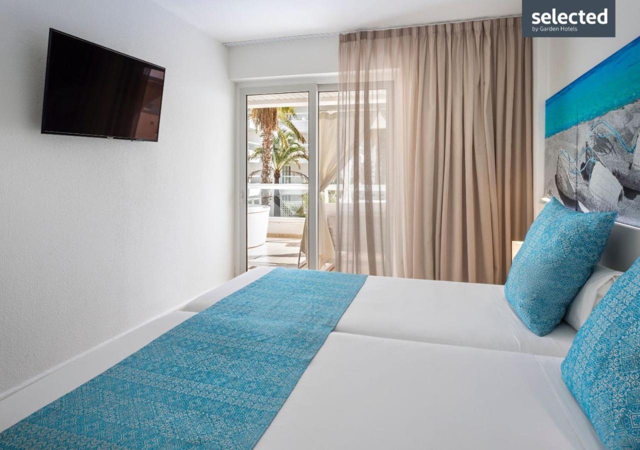Aparthotel Tropic Garden Santa Eularia des Riu Bagian luar foto
