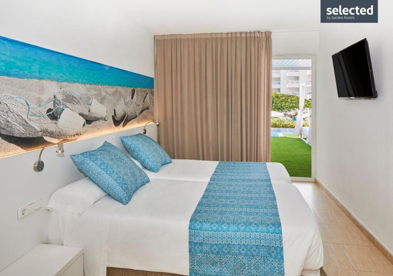 Aparthotel Tropic Garden Santa Eularia des Riu Bagian luar foto
